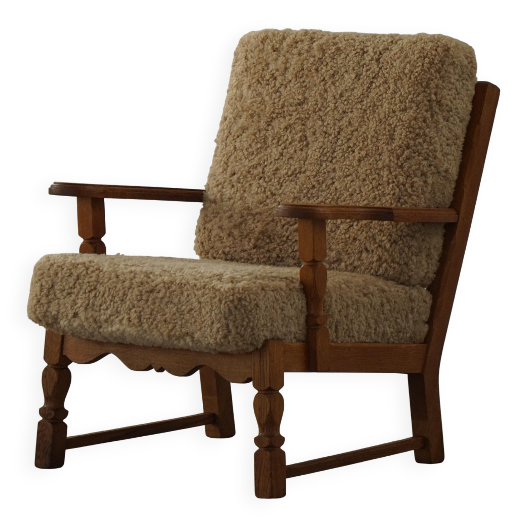 Danish modernist lounge chair in oak and lambswool, Henning Kjærnulf, 1960s