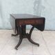 19th-century English style mahogany drop-leaf table.