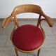 Vintage curved wooden armchair