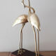 Couple of wading birds in brass on wooden base