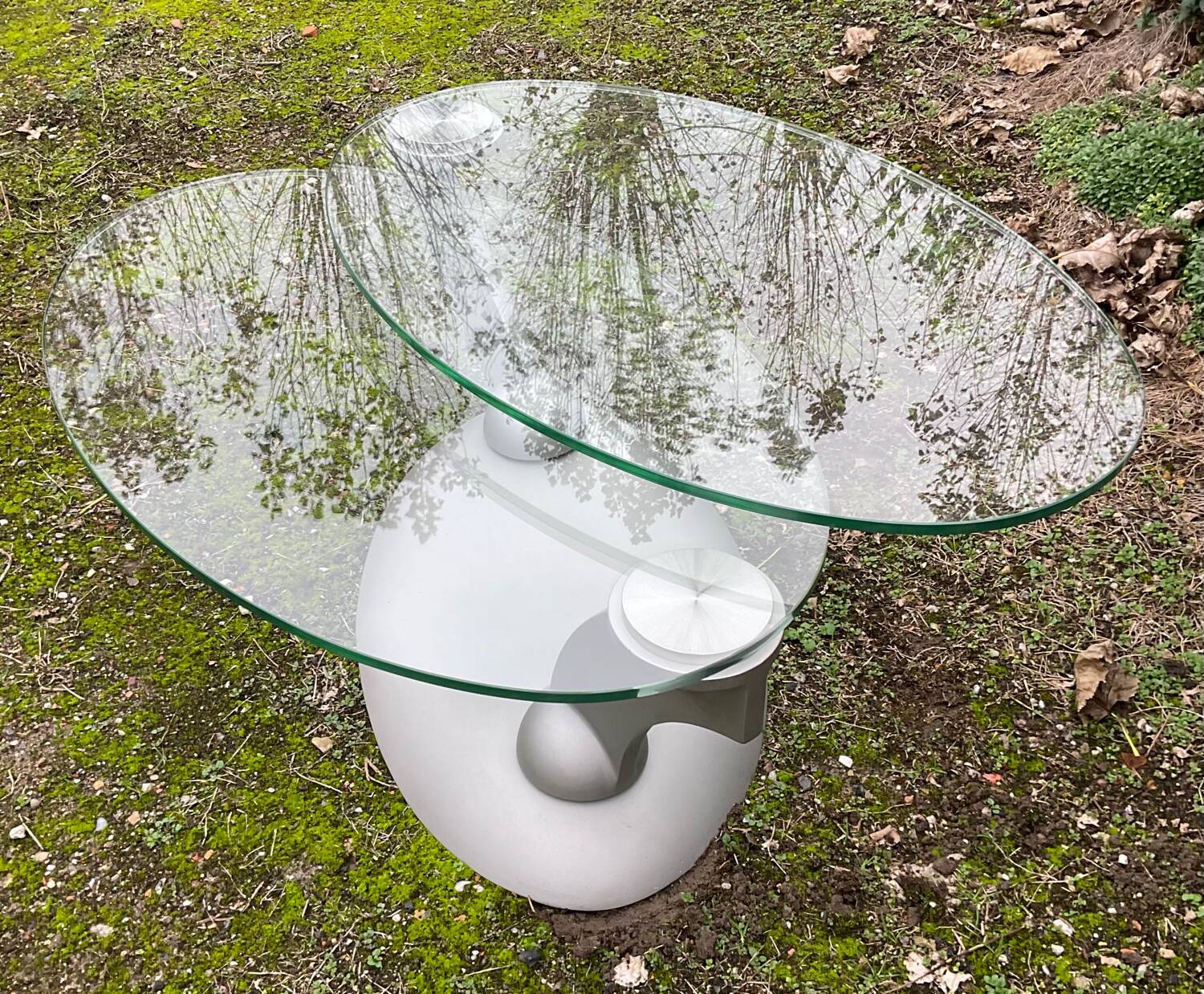 Naos designer coffee table in tempered glass and cast iron