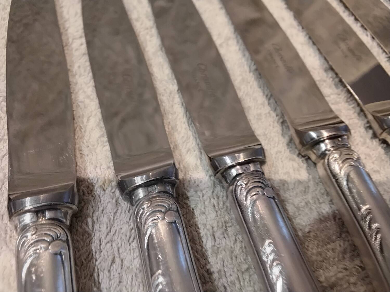 12 silver-plated dessert knives by Christofle Marly, 19.7cm