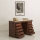 Small vintage stained wooden countertop with 2 shelves and 10 drawers