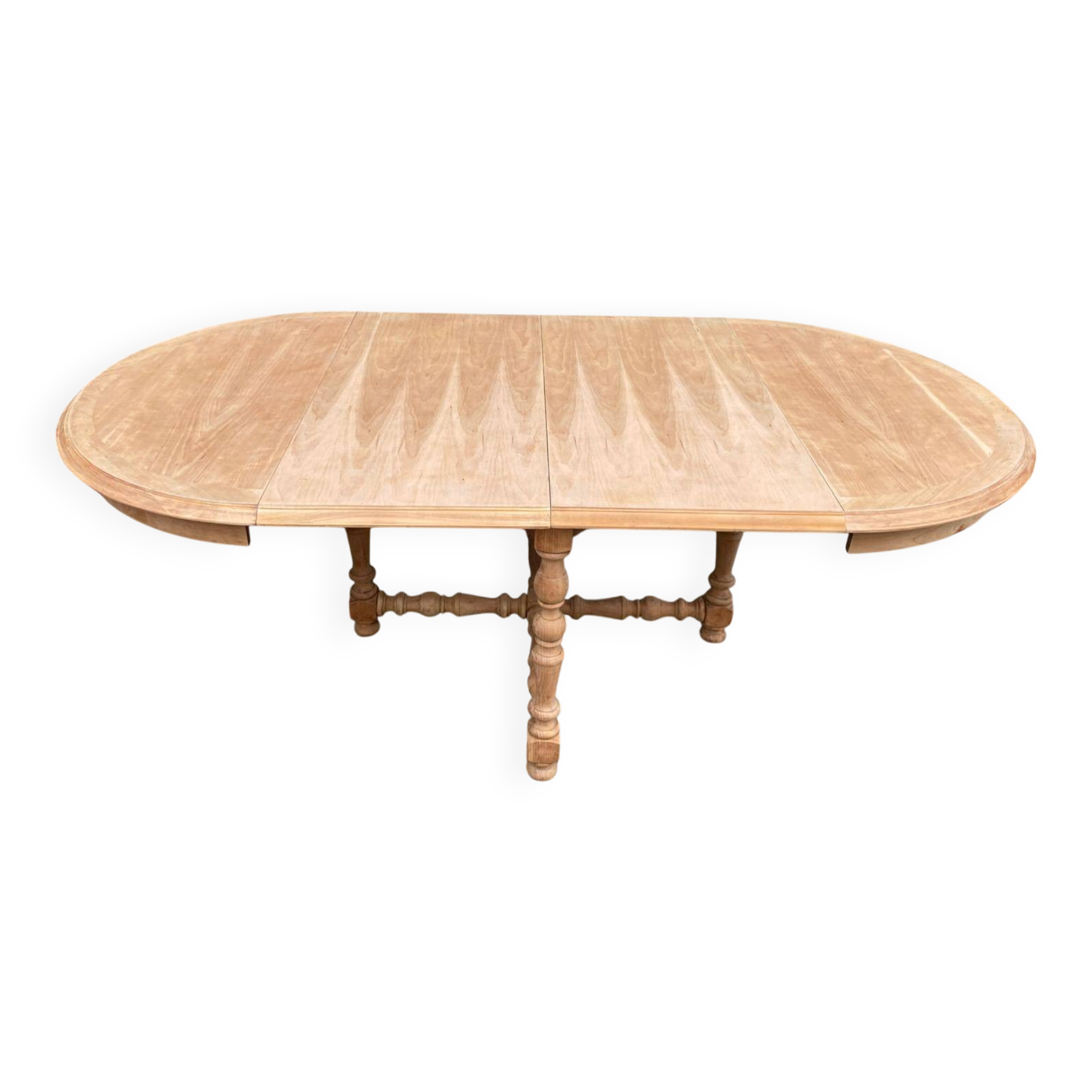 Round extendable farmhouse dining table, stripped, Louis XIII style from the 1960s.