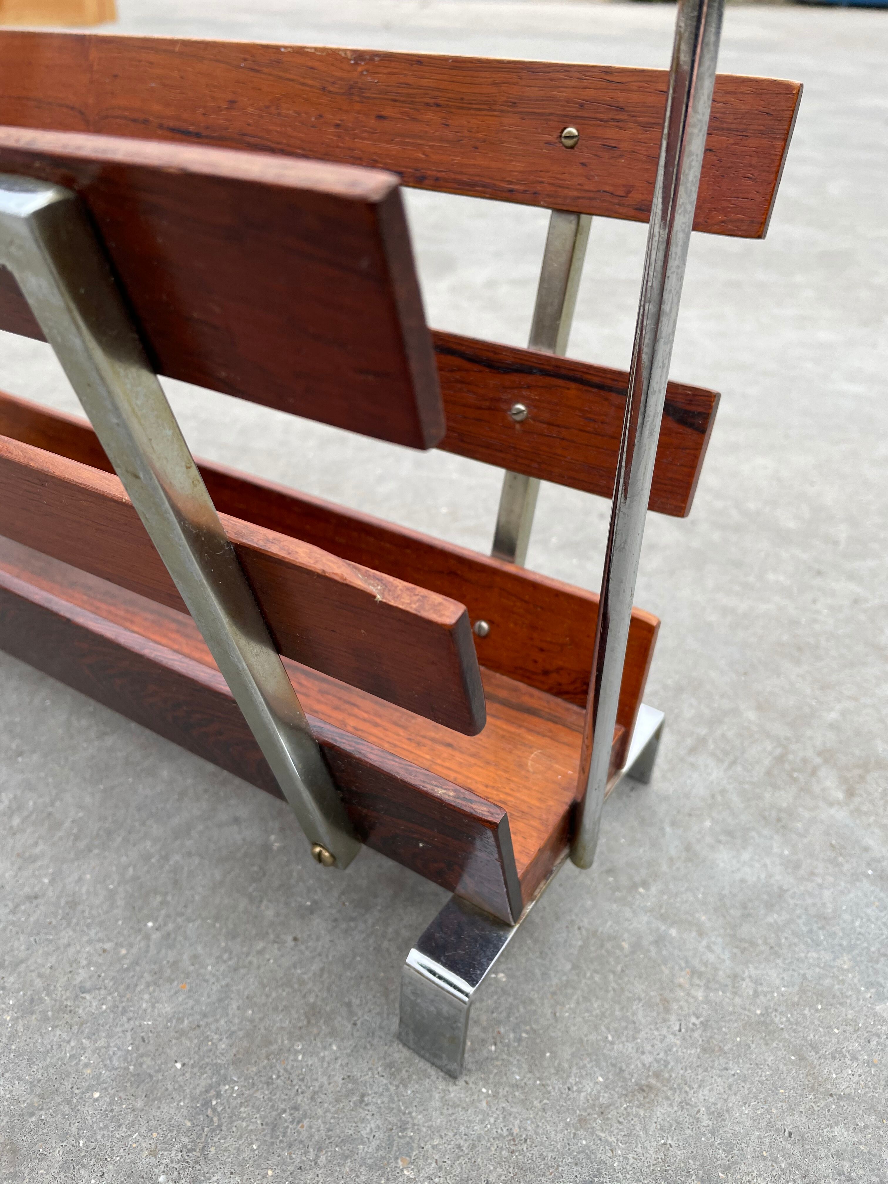 Vintage magazine rack from  rosewood and chrome design