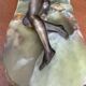 Art Deco female sculpture in bronze with onyx base.