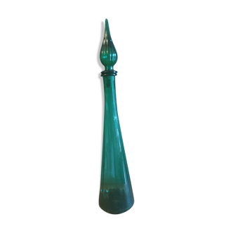 Green bottle in vintage glass