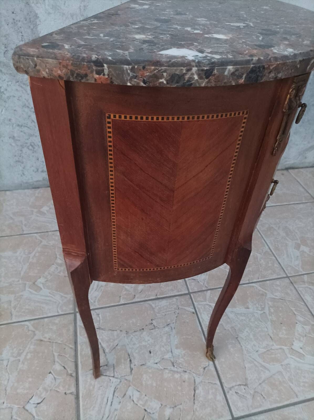 Half-moon commode in Louis XV style with walnut veneer.