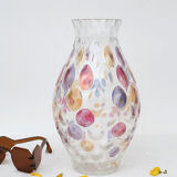 Glass vase and multicolored scales