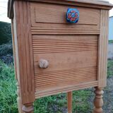 Raw wood bedside table