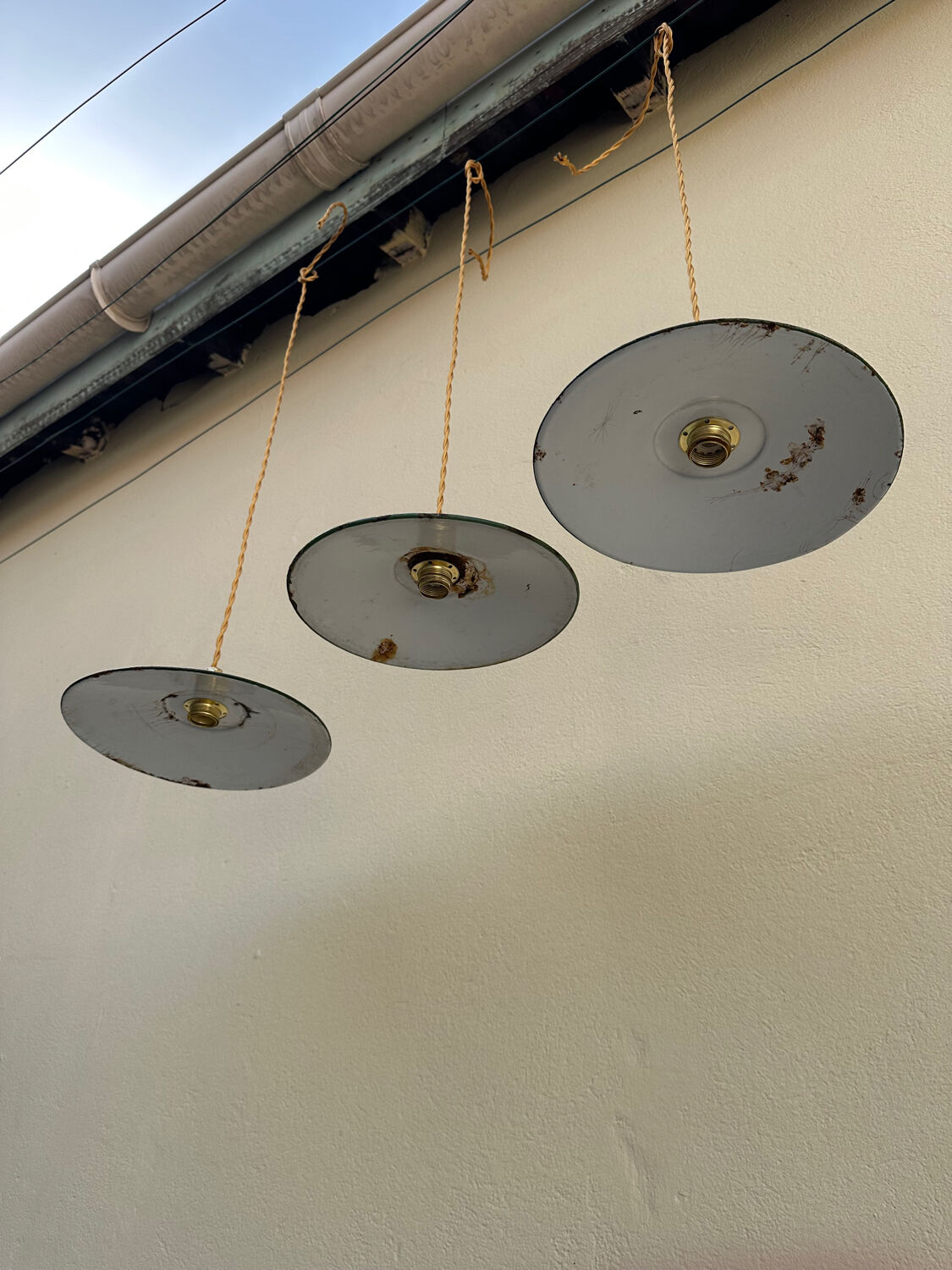 Trio of vintage pendant lights in green and white enameled sheet metal, industrial farmhouse decor