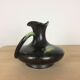 Thulin Belgium pitcher, black ceramic handle