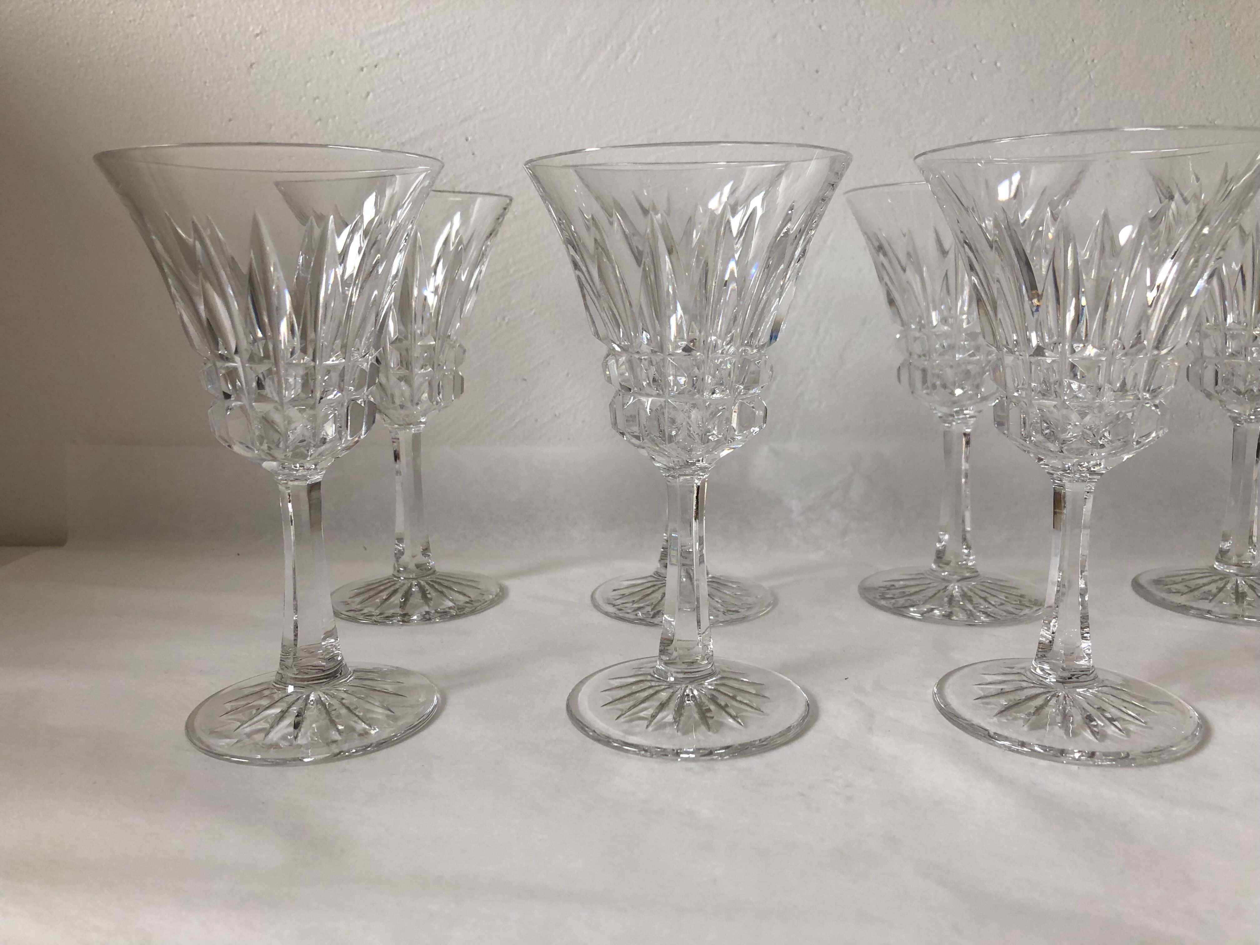 Eight Baccarat crystal wine glasses
