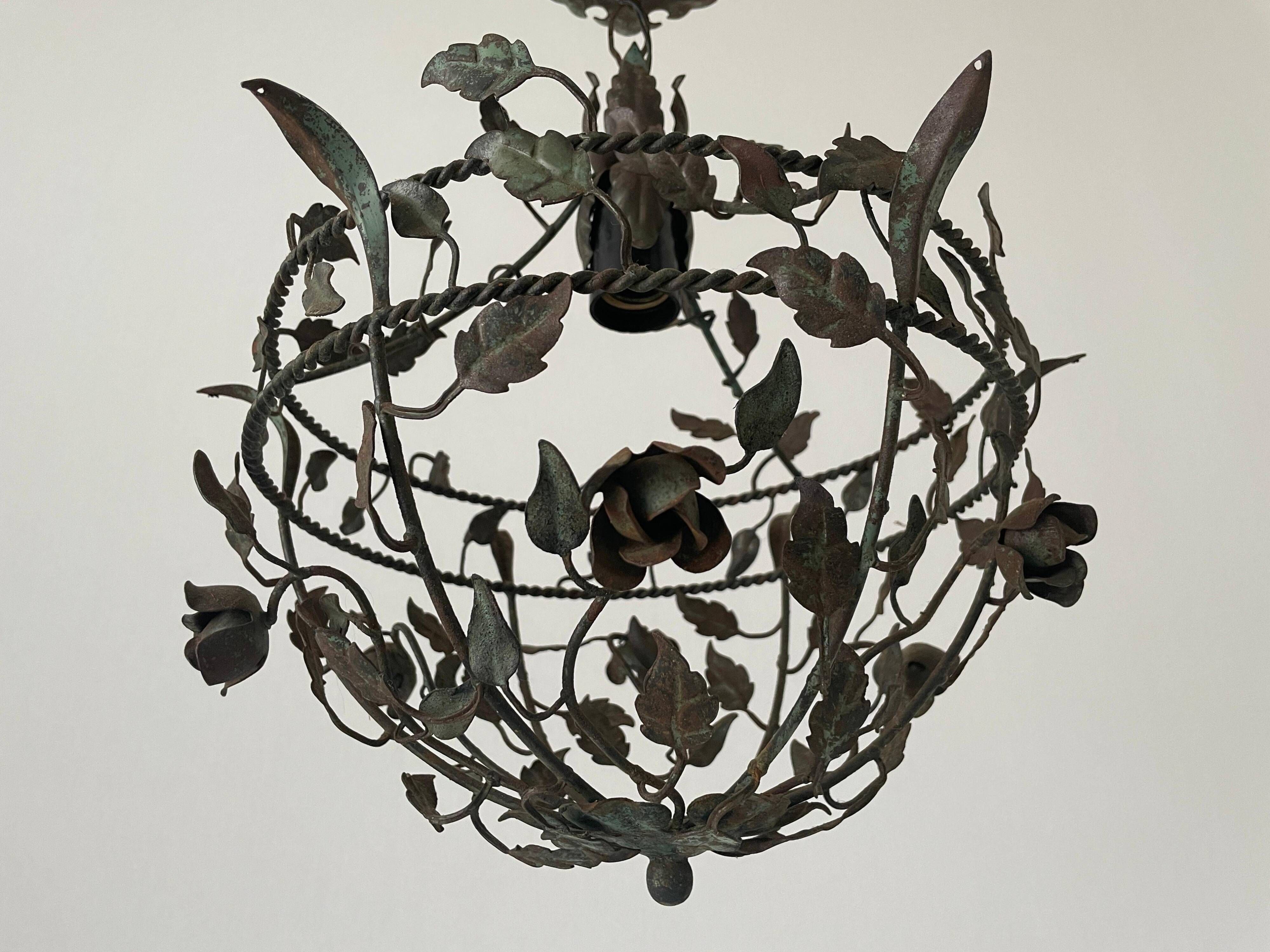 Patinated metal ceiling light with a floral and leaf pattern, 1950s, Italy.