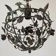Patinated metal ceiling light with a floral and leaf pattern, 1950s, Italy.