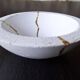 Concrete cup, tinted waxed, inlaid with gold leaf drips in a Kintsugi inspiration