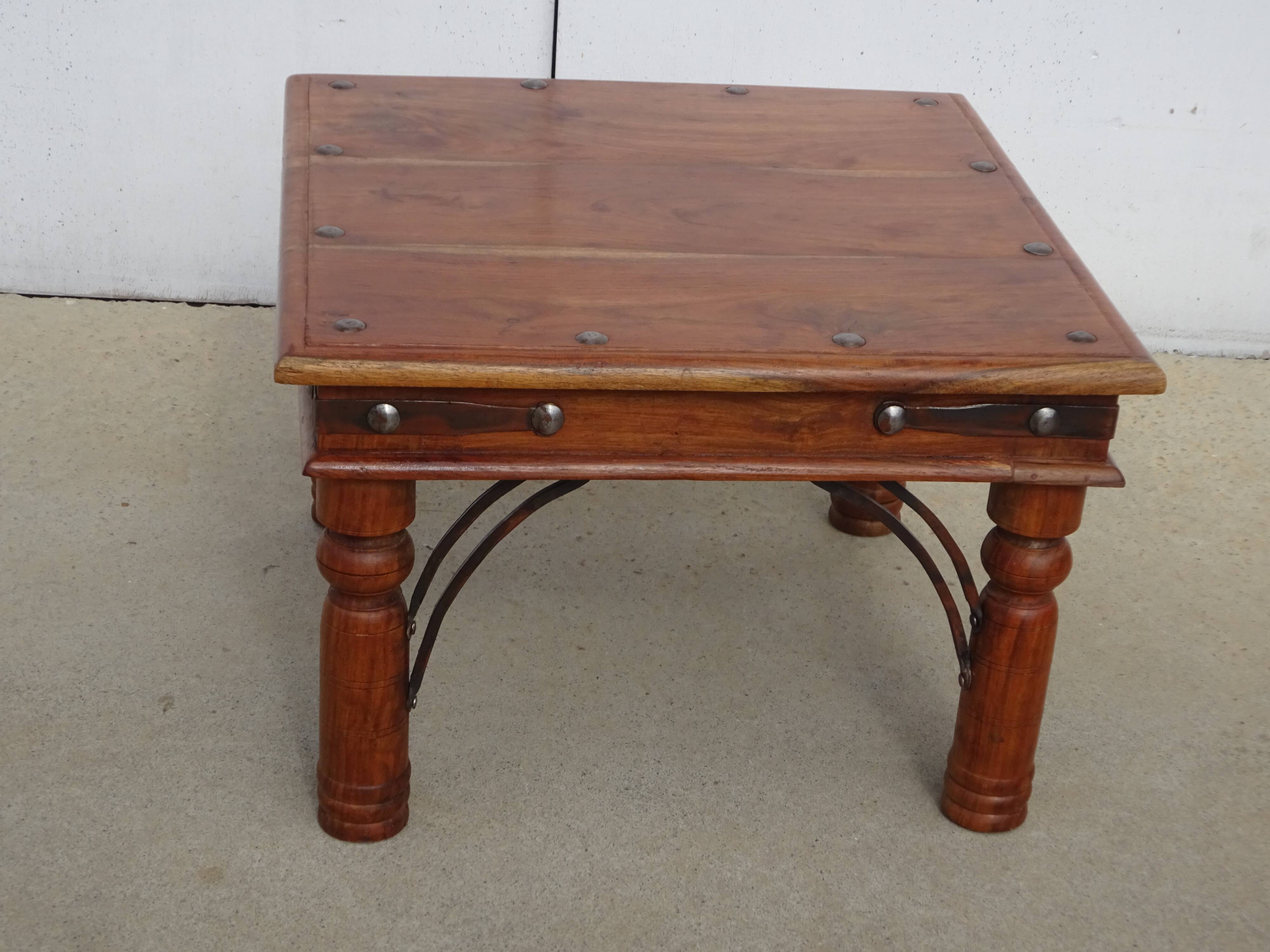 Wooden and wrought iron coffee table