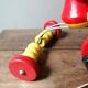 Old Mickey Mouse toy on his wooden tricycle