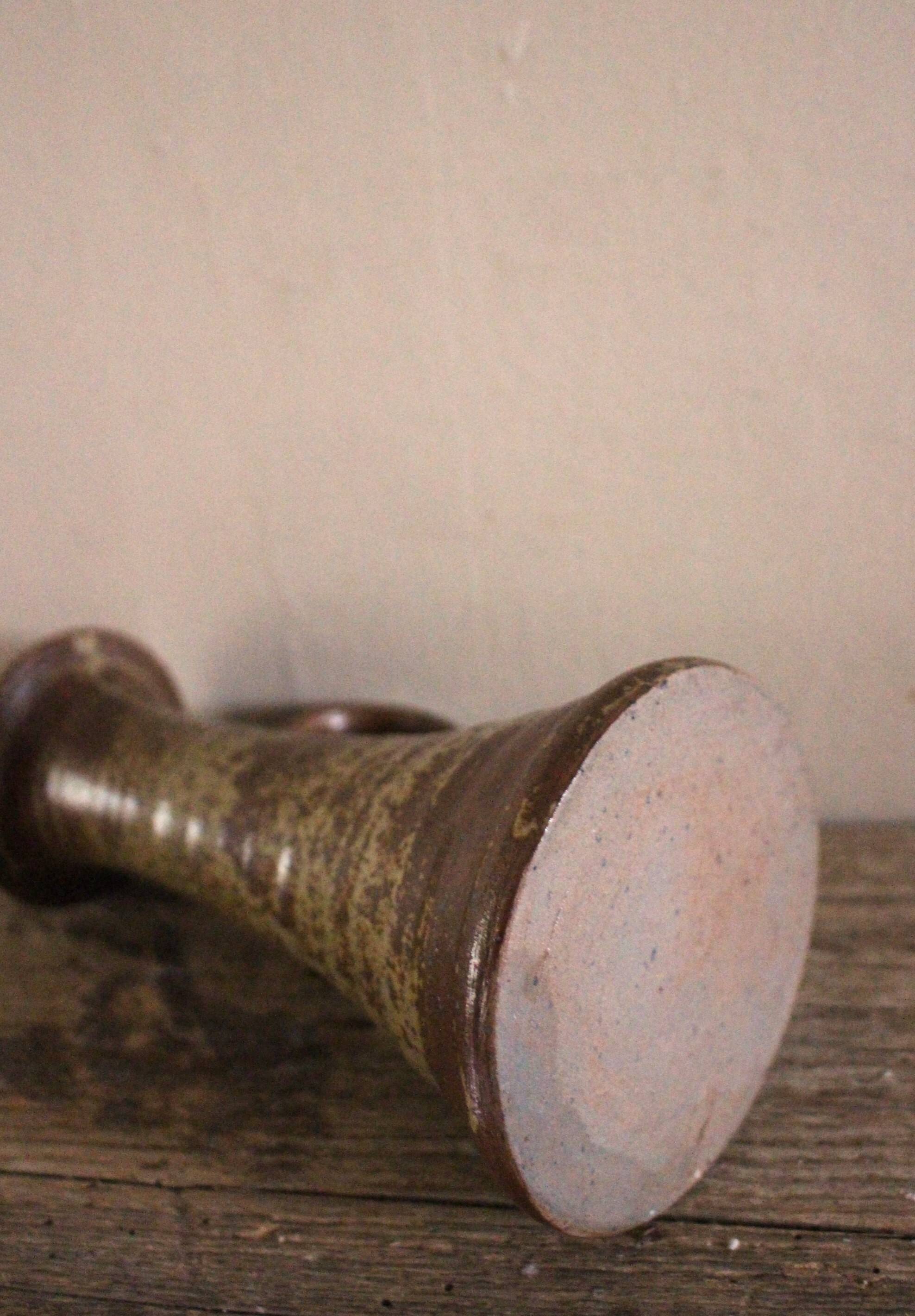 Vintage pyrite-glazed stoneware candlestick with handle