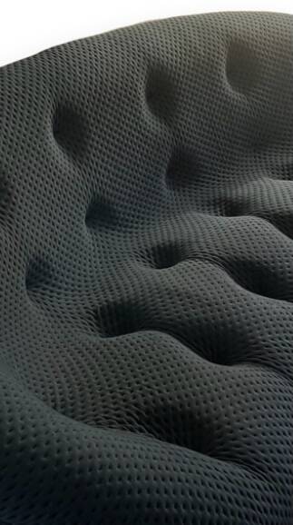 High-end black Ploum sofa at Ligne Roset