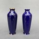 Pair of 1900 Limoges vases with blue background and gold highlights, R. Rosier decorations