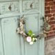 Cloakroom with sage green wall coats