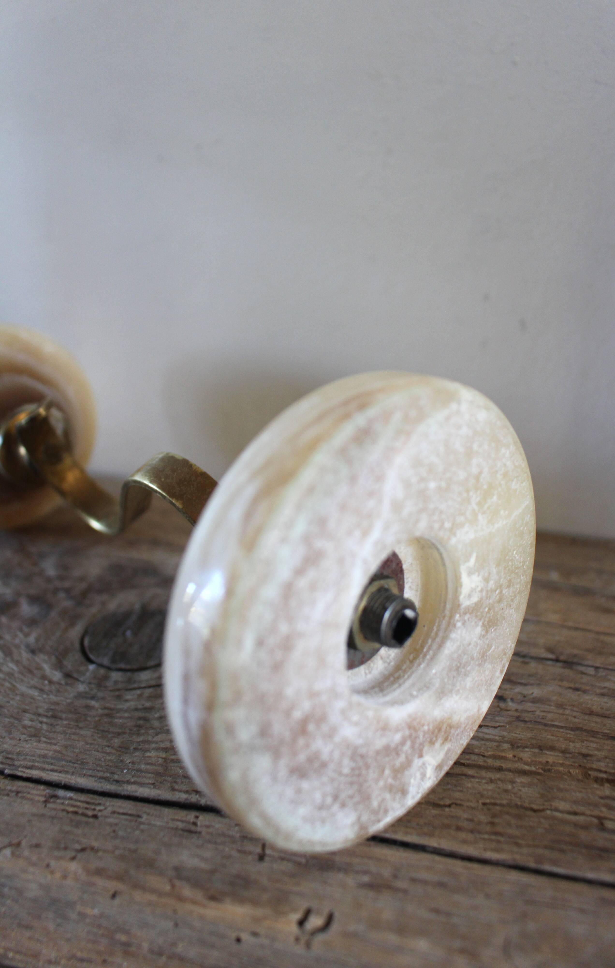 Curved brass and onyx candlestick