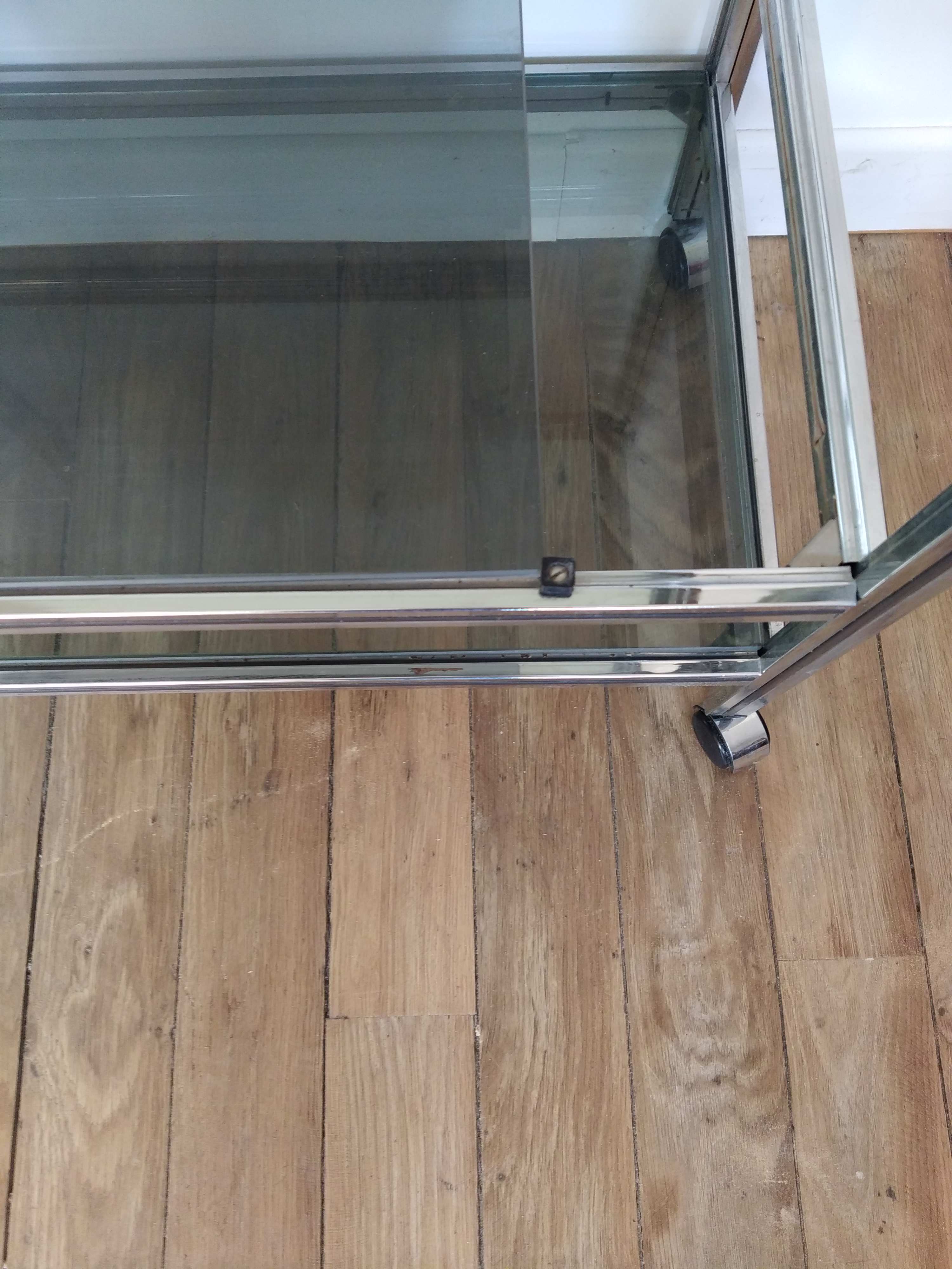 Stainless steel bar and smoked glass serving table