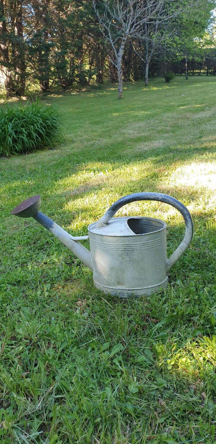 White zinc watering can