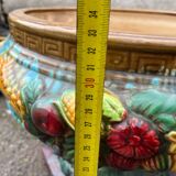 Large neoclassical majolica jardinière with ram's heads.