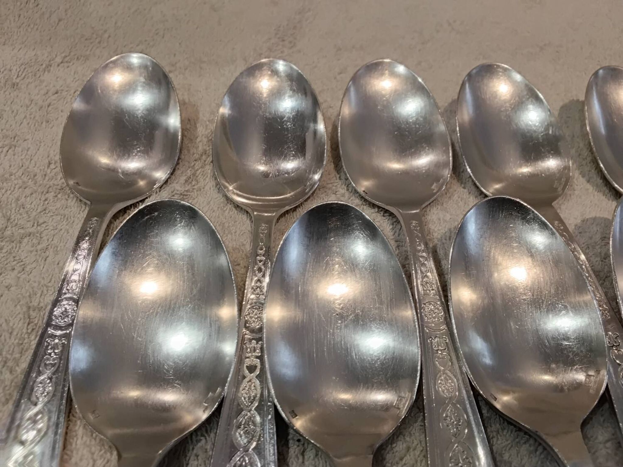 11 silver-plated soup spoons by Christofle Villeroy & Boch, striped