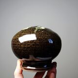 Brown and green glazed stoneware flower holder, vintage craftsmanship from the 1970s-1980s.