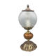 Hollywood Regency bedside lamp in gold metal with a glass globe.