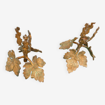 Pair of candlesticks with vine leaves