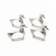 Four silver-plated napkin rings in the shape of a duck/goose