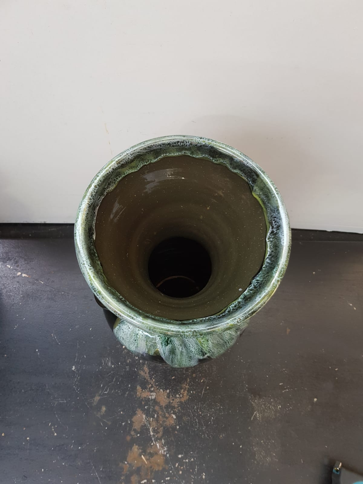 Old black enamelled ceramic Gaubier vase with green white vintage drips