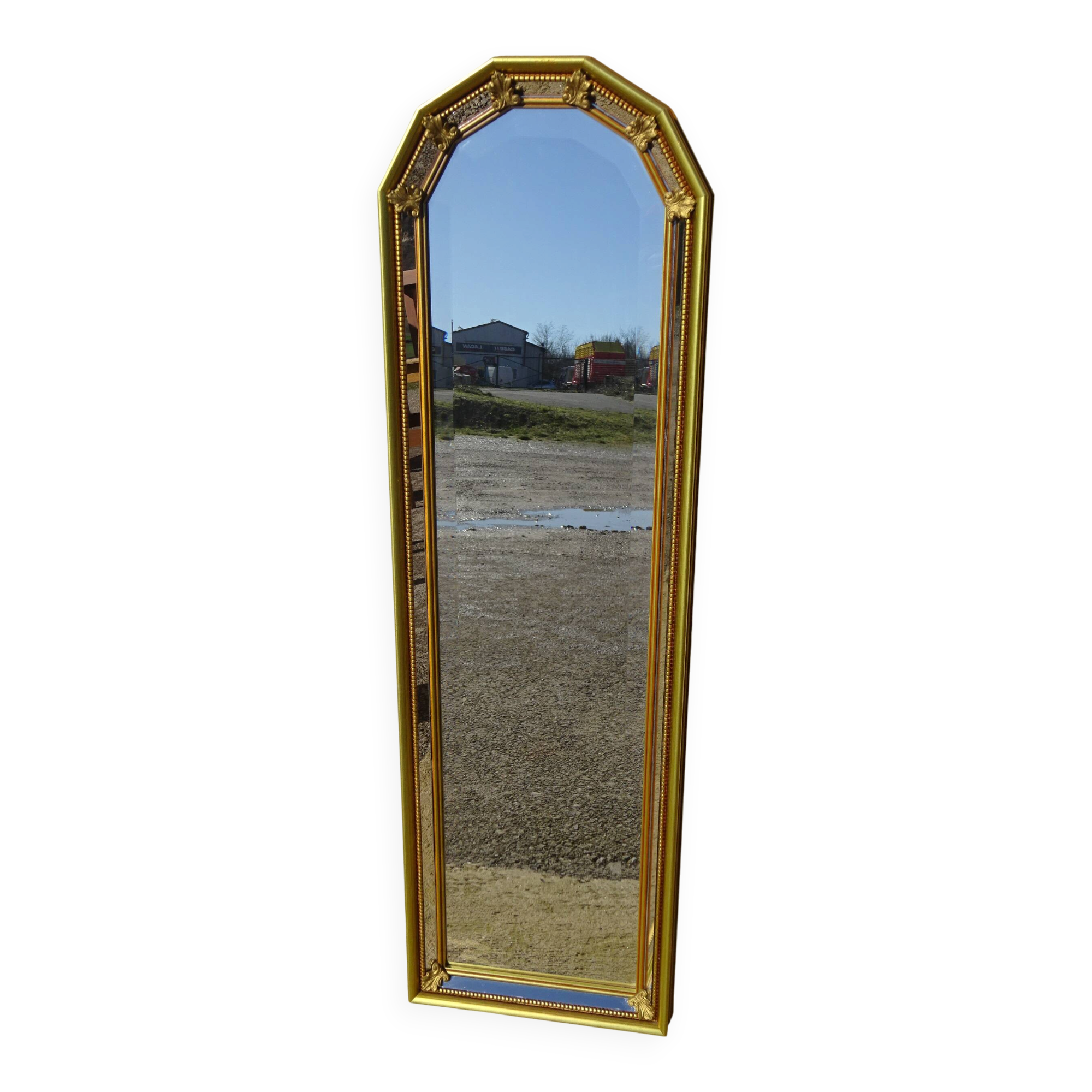 Hall mirror, gilded frame with fillets and fleur-de-lis.