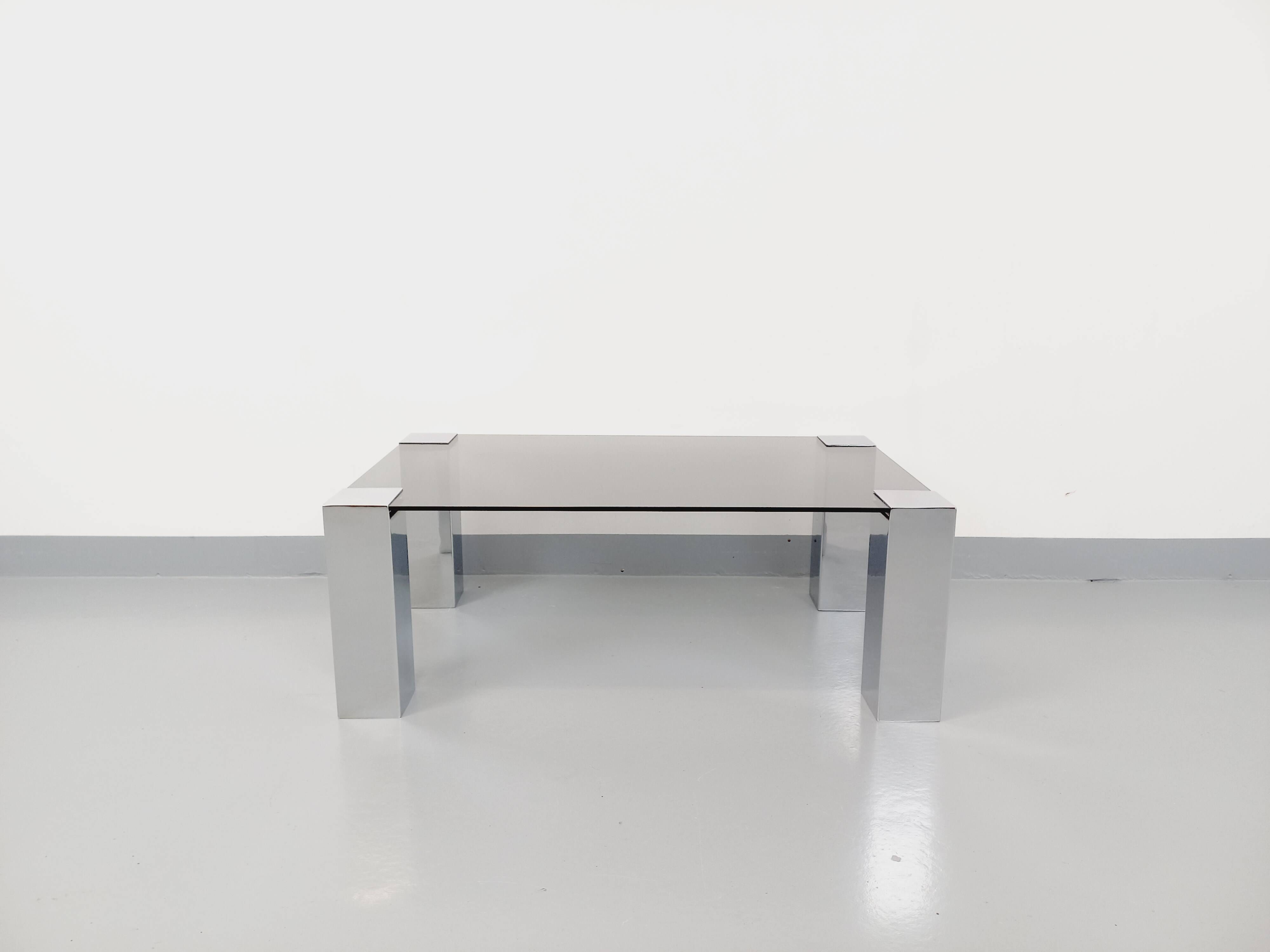 Vintage Italian coffee table Cidue in smoked glass and chrome metal from the 70s