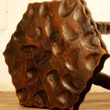 Brutalist tripod stool cut with gouge