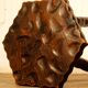 Brutalist tripod stool cut with gouge