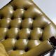 Green leather tufted office chair