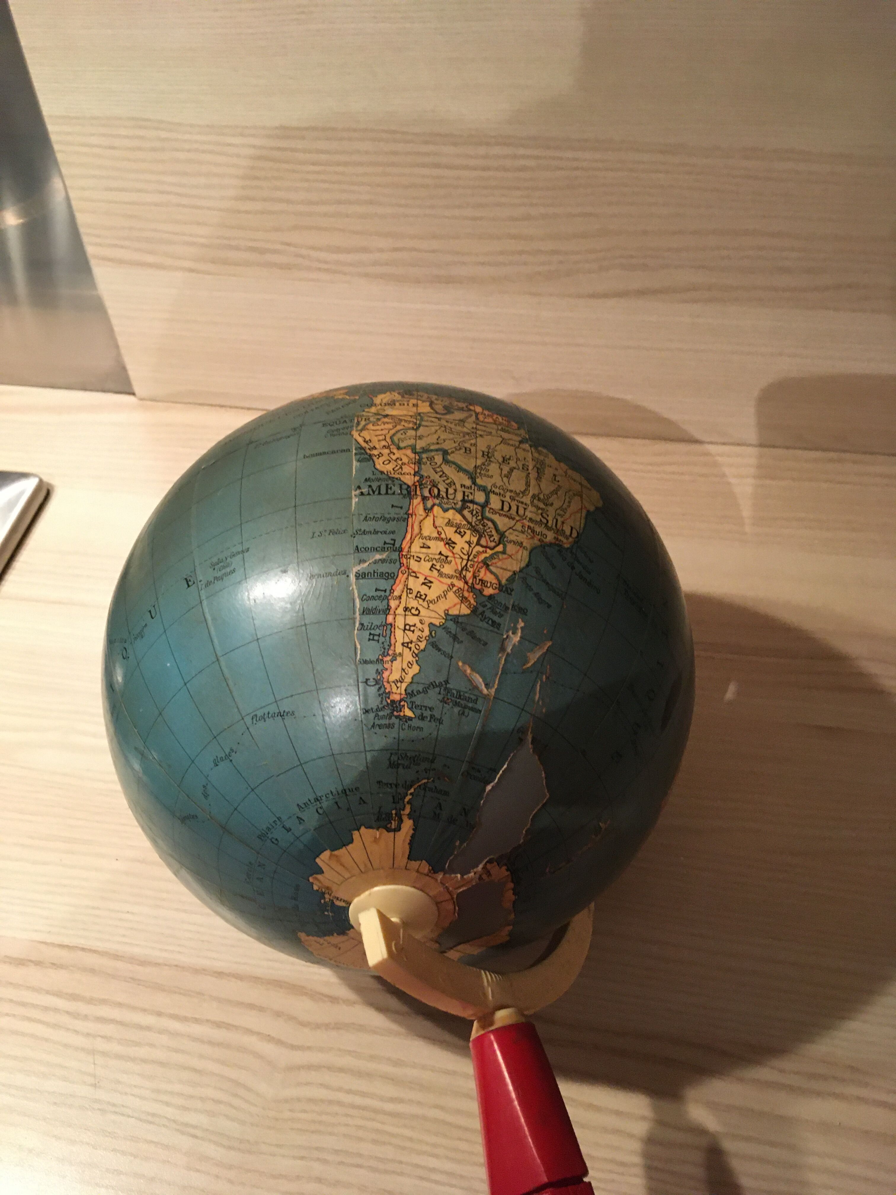 Earth globe ancient wooden foot