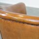 Sheep leather club chair finished with black piping