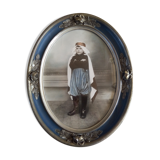 Oval frame with Art Nouveau colorized photo