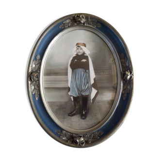 Oval frame with Art Nouveau colorized photo