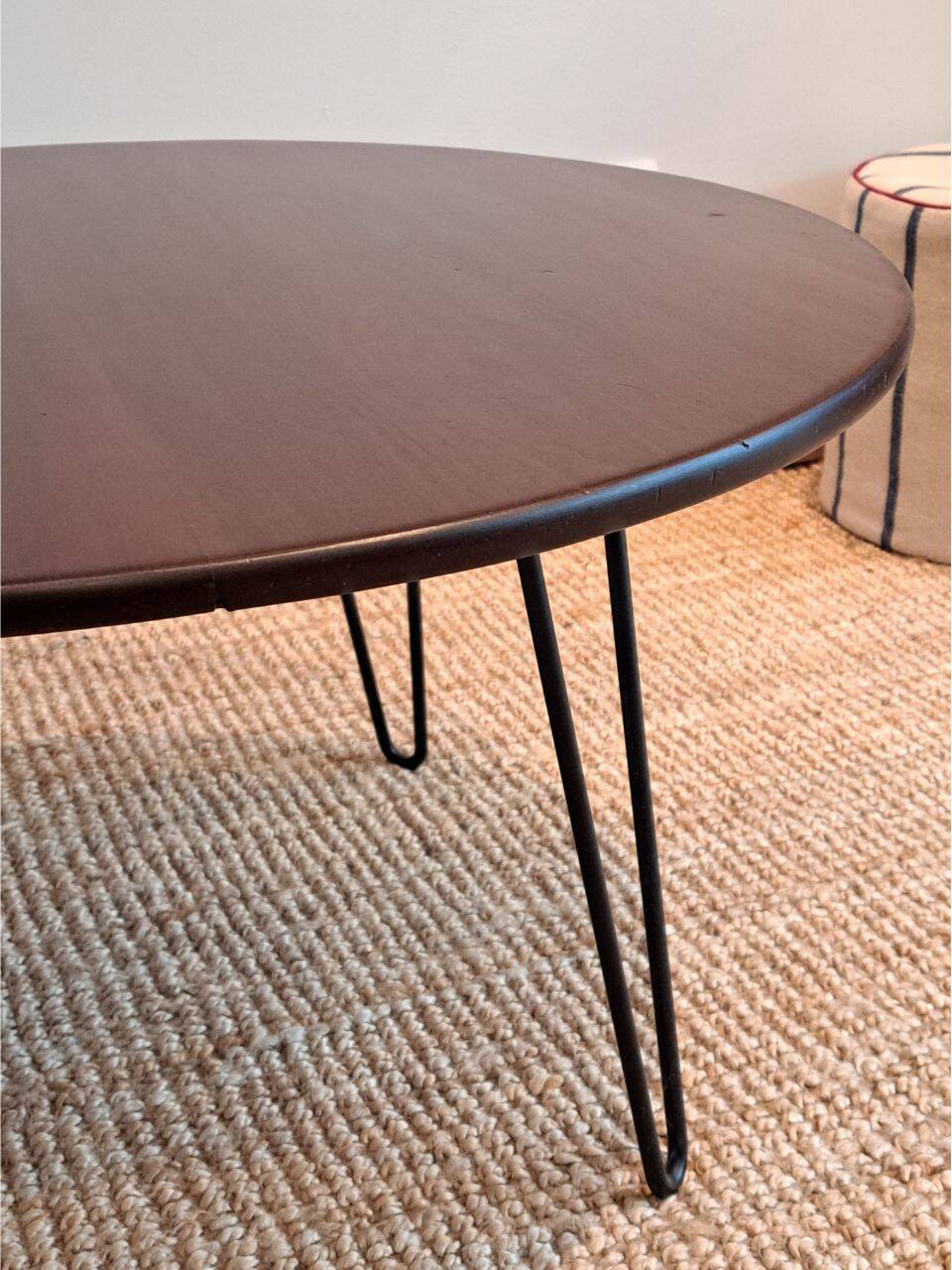 Round coffee table with mahogany wood top