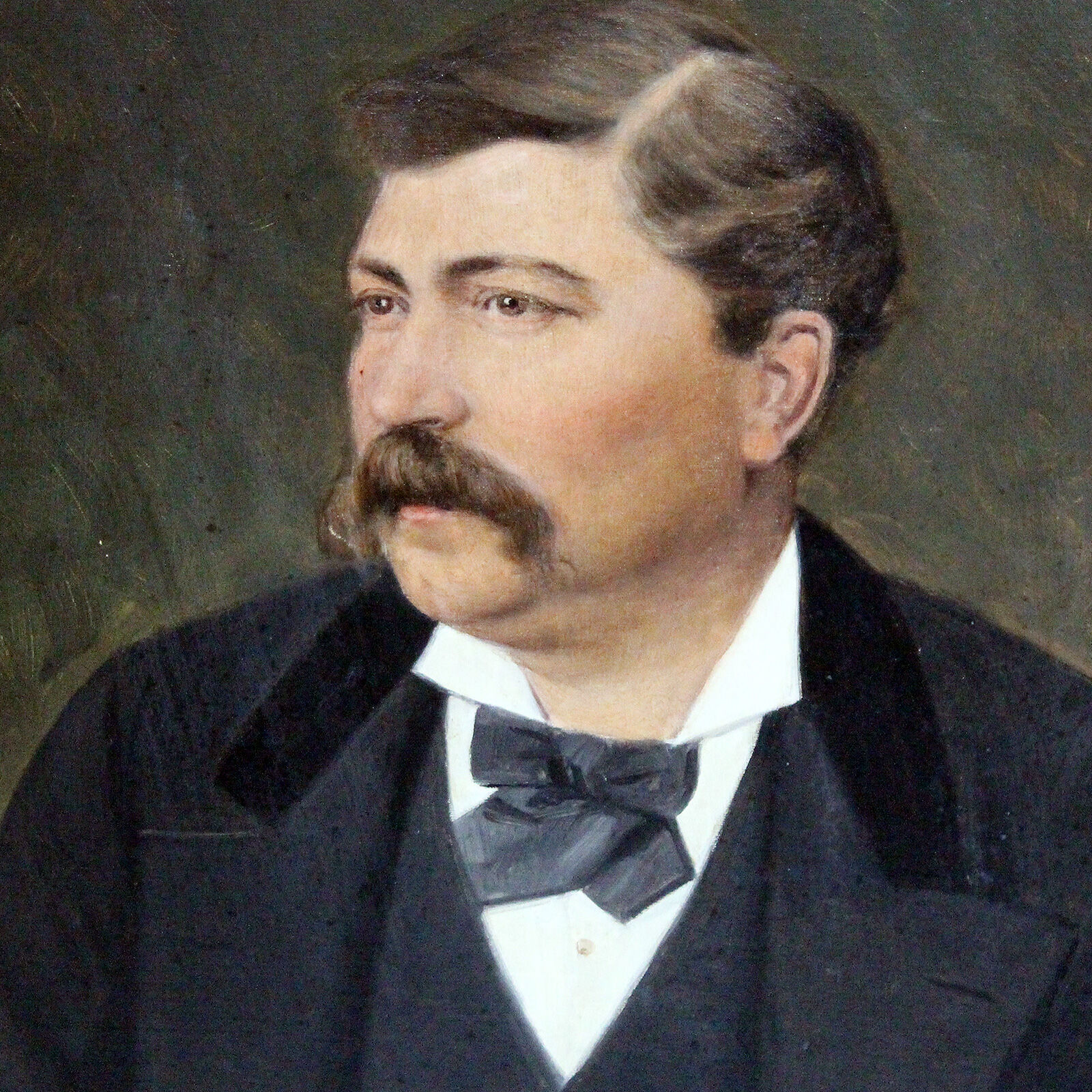 Portrait of a gentleman with blue bow tie