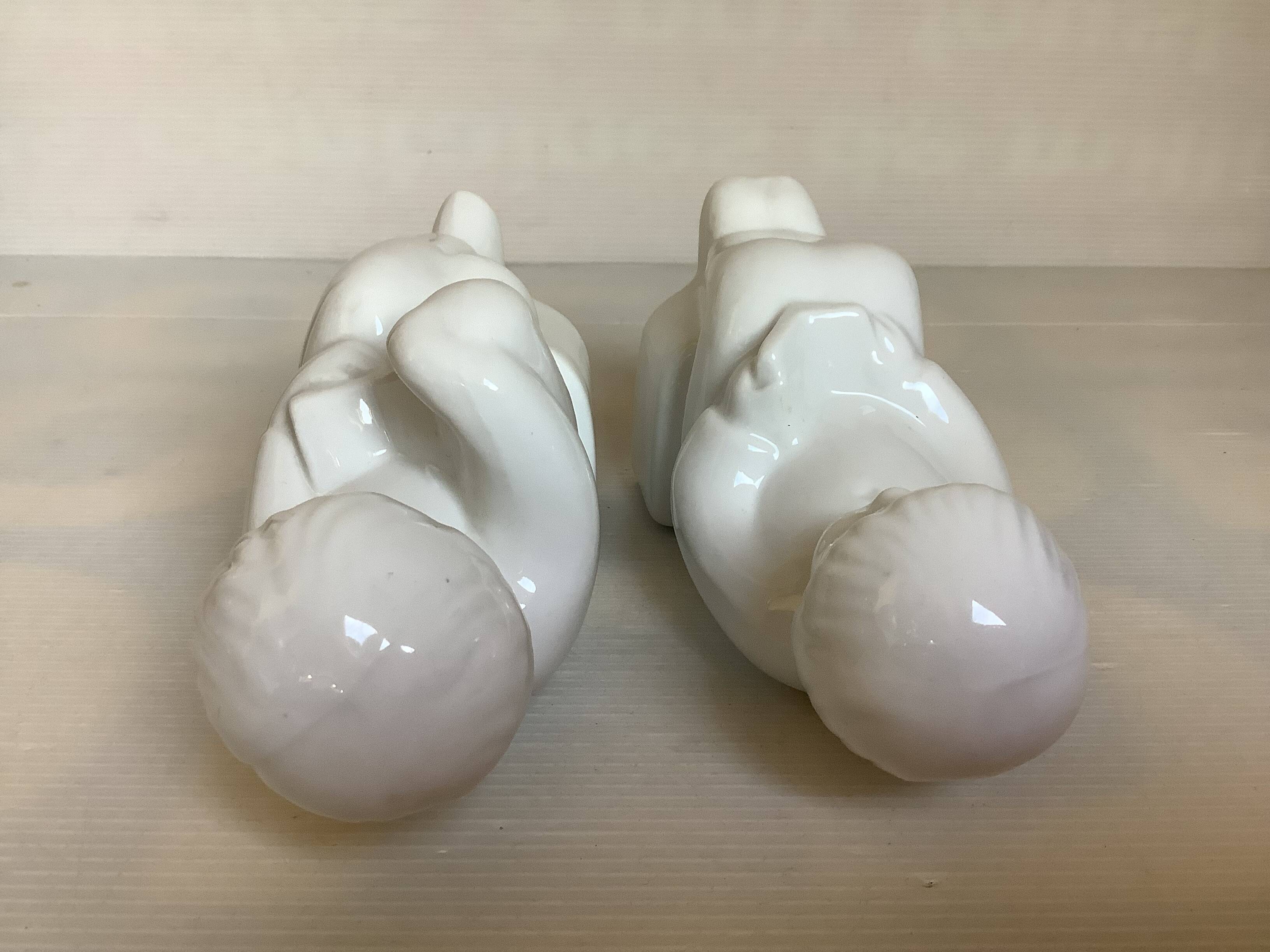 Pair of bookends featuring children reading from the 1970s.