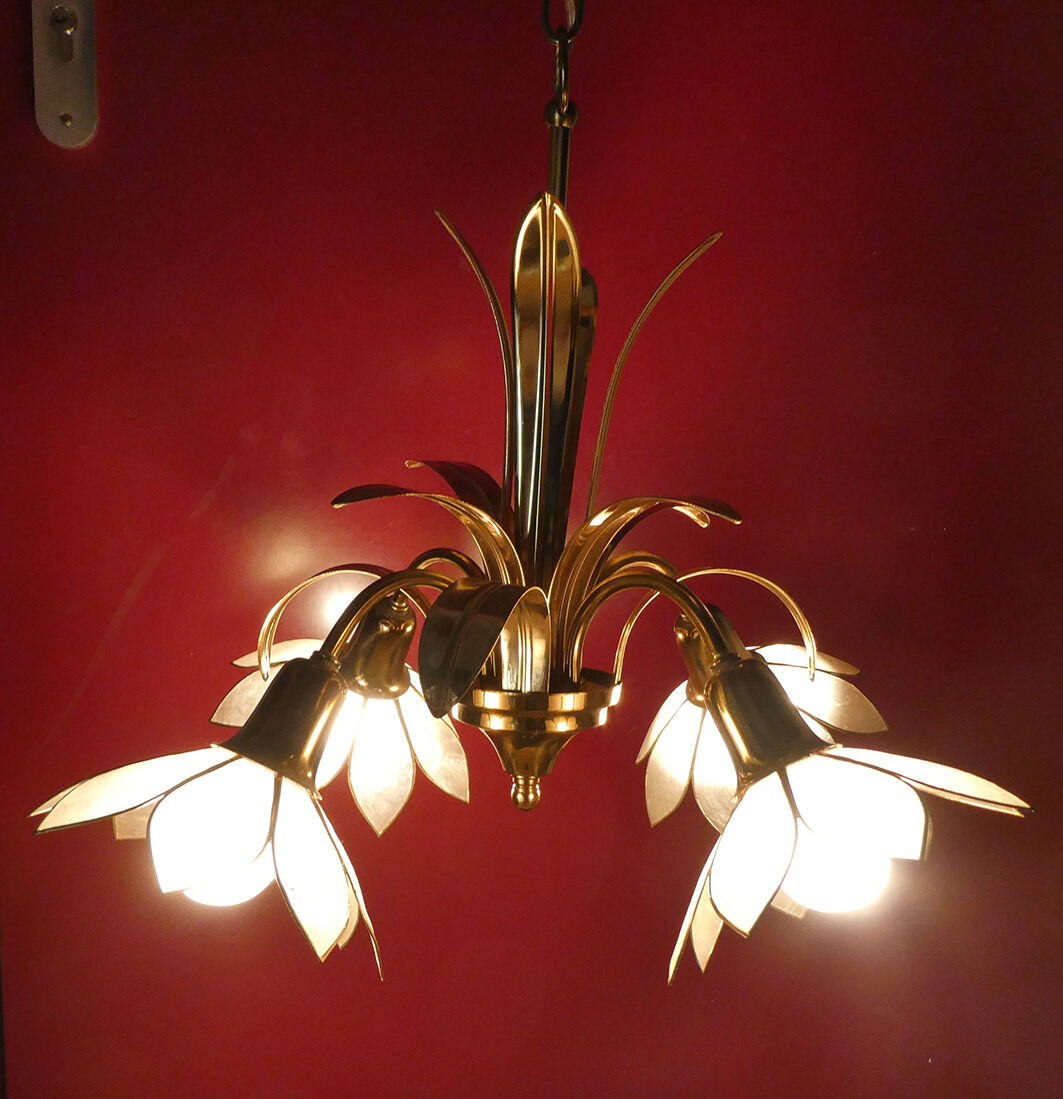 Brass chandelier and flowers in mother-of-pearl petals