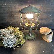 Antique patinated green metal lamp, Art Nouveau style, early 20th century.